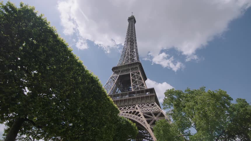 Clouds float above the eiffel tower