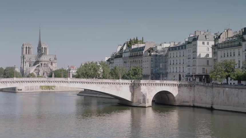 Bridge over a river of water lined with buildings