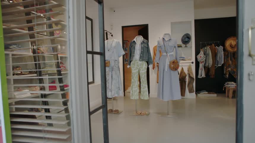 Clothes are on display in a boutique