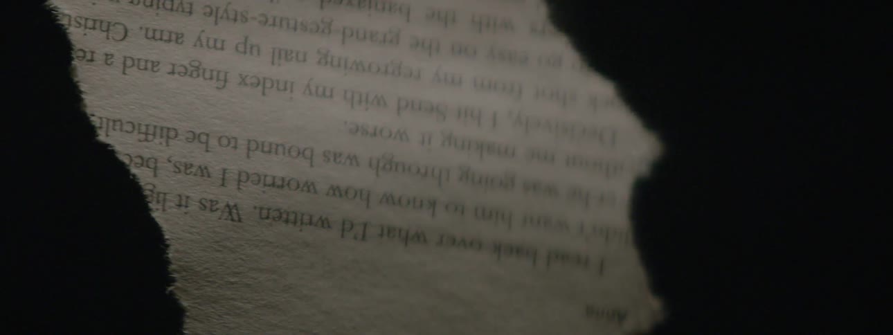 Light and shadow are passing across a fragment of a text