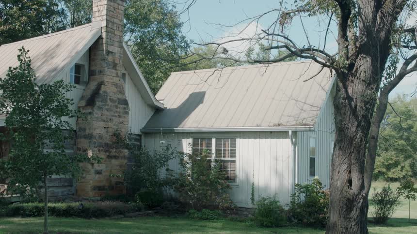 White farmhouse in late afternoon
