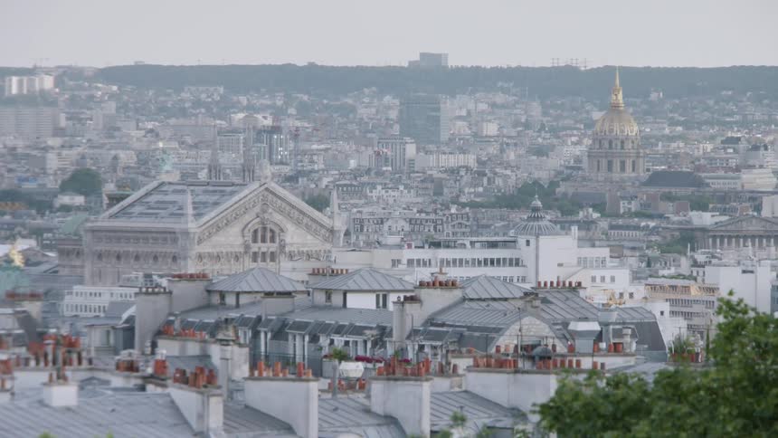 City buildings are shown at sunrise