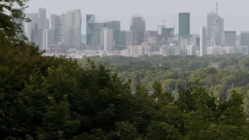 Skyscrapers stand in the distance