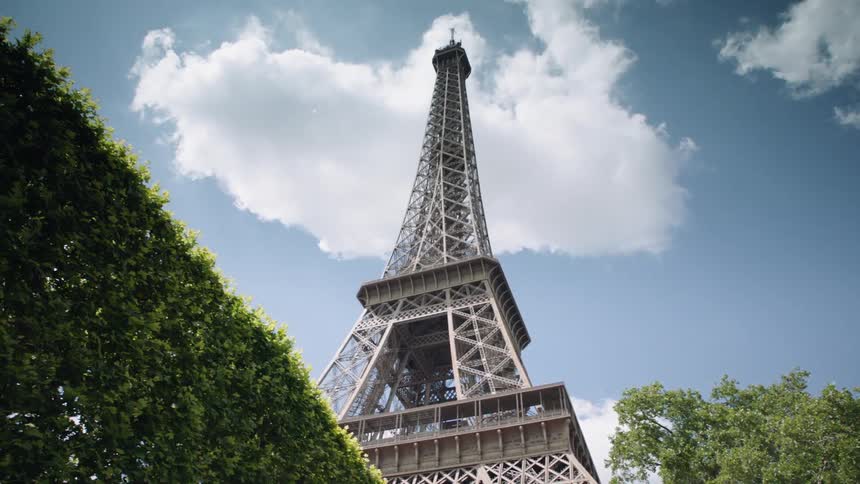 Clouds float above the eiffel tower
