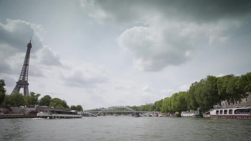 River of water flows through a city on a cloudy day