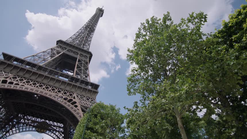 Clouds float above the eiffel tower