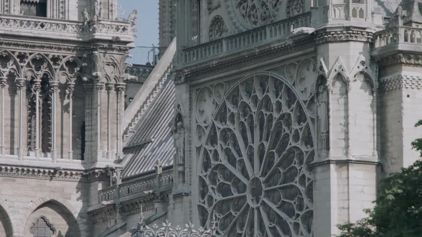 A stone cathedral stands in a city