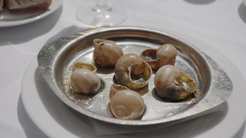 Escargot sits on a platter