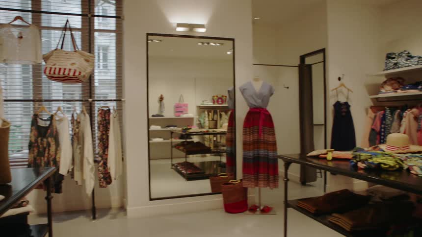 Inside of a dress boutique in a city