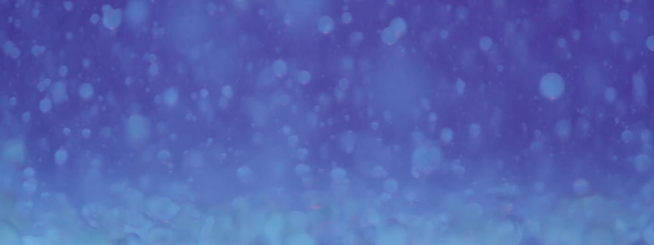 Drops and balls float in liquid