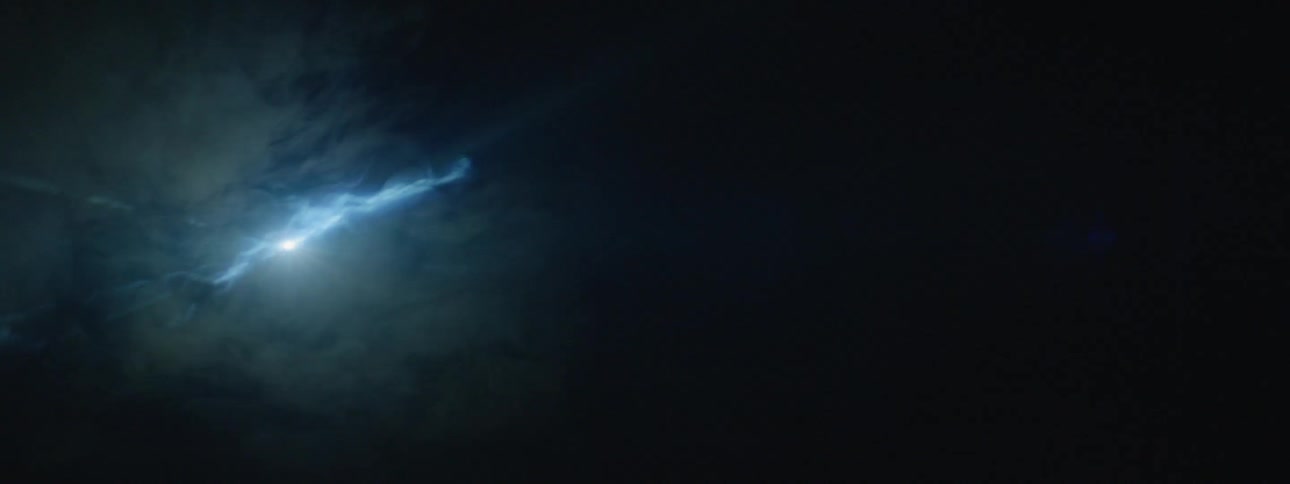 Lightning flashes in the night sky