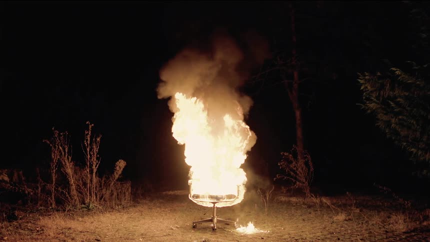 An office chair on fire