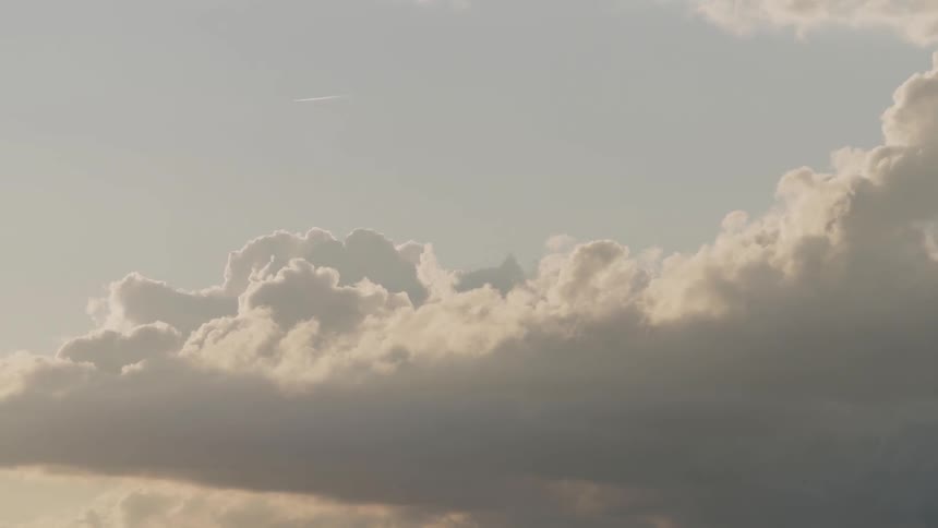 The clouds are heavy in the partially cloudy sky
