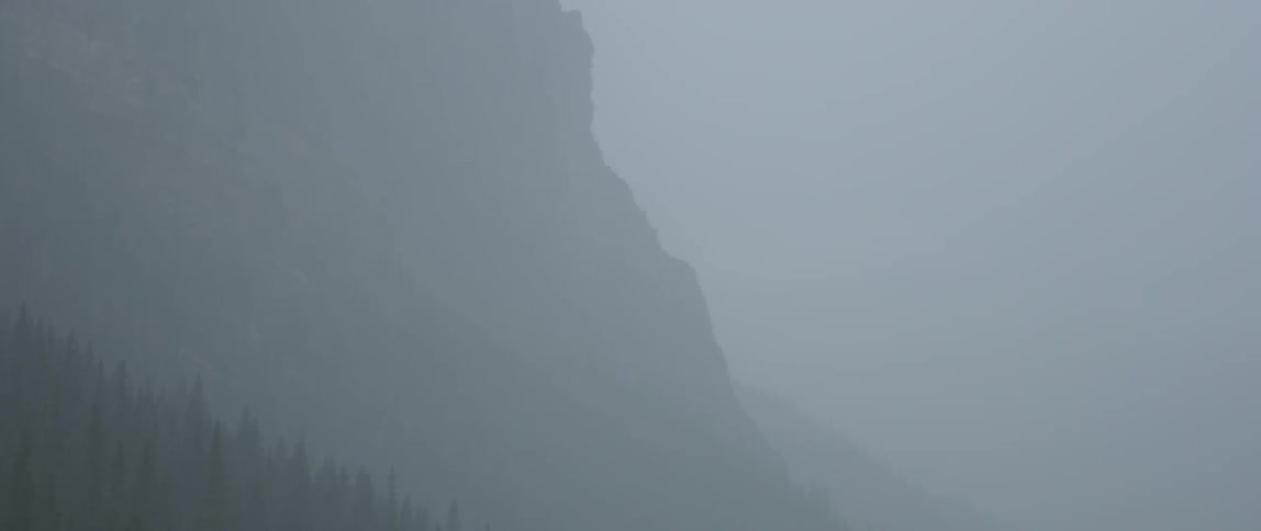 Mist covers a mountain slope