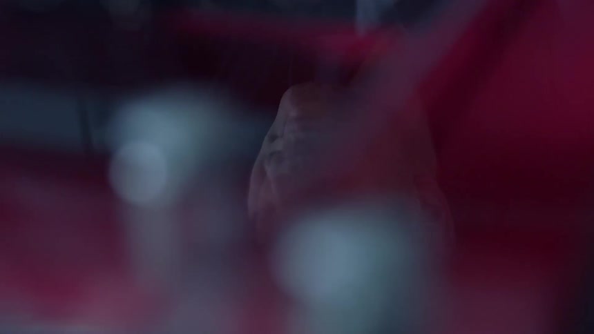 A person is upside down in the blurry area