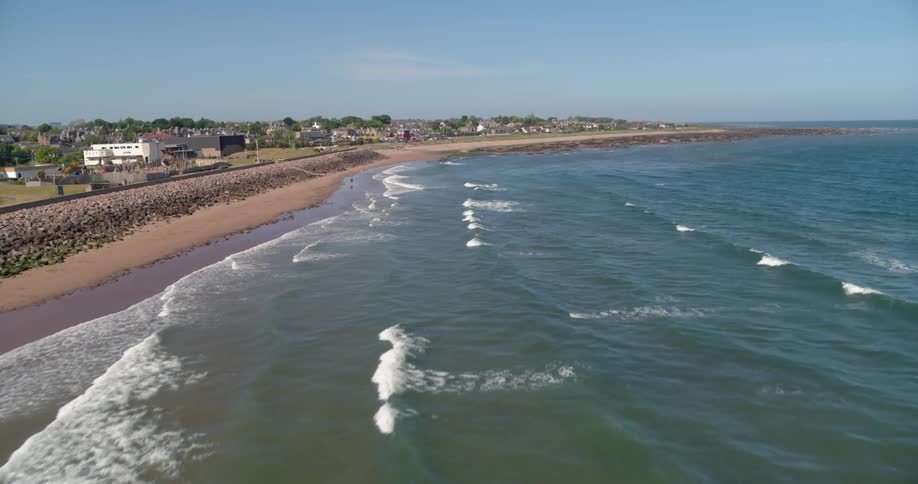 Waves roll into the shore