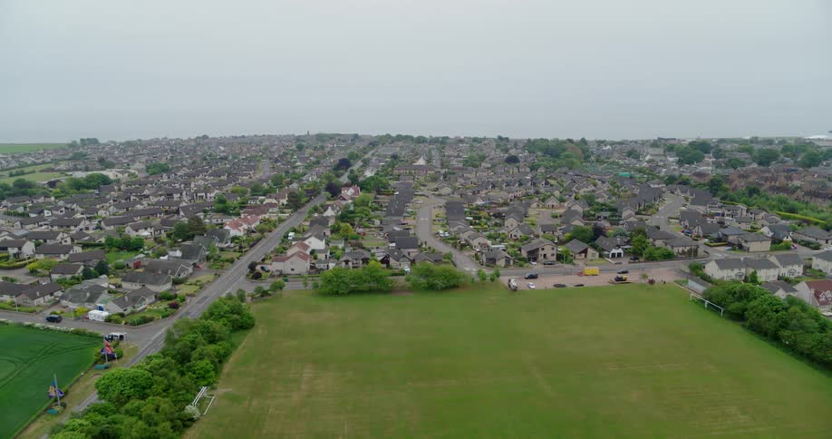 The long road leads into the town ahead