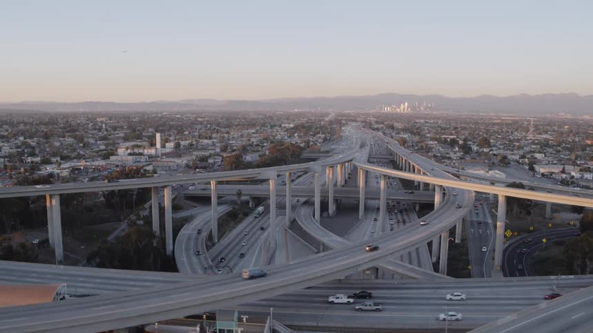 Traffic moves on a city's highway system