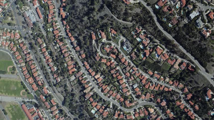 Houses sit in a neighborhood