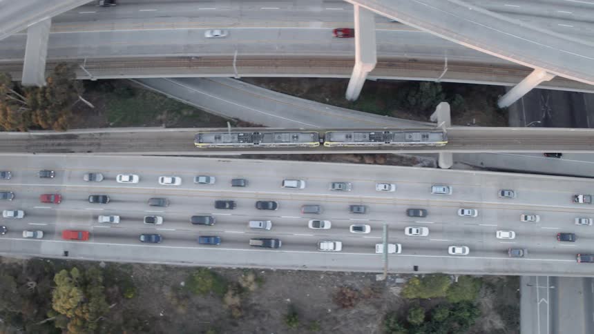 Cars drive on a city highway