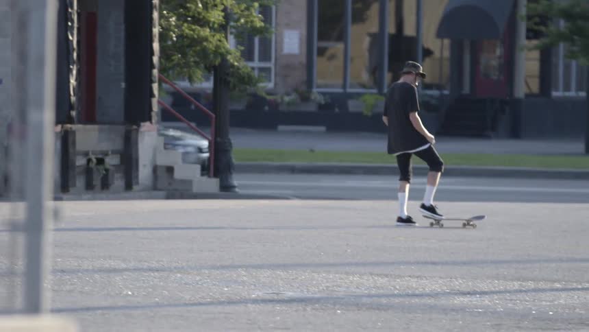 A person skateboarding outdoors