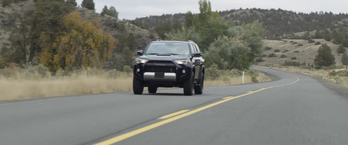 Vehicle drives on a rural road