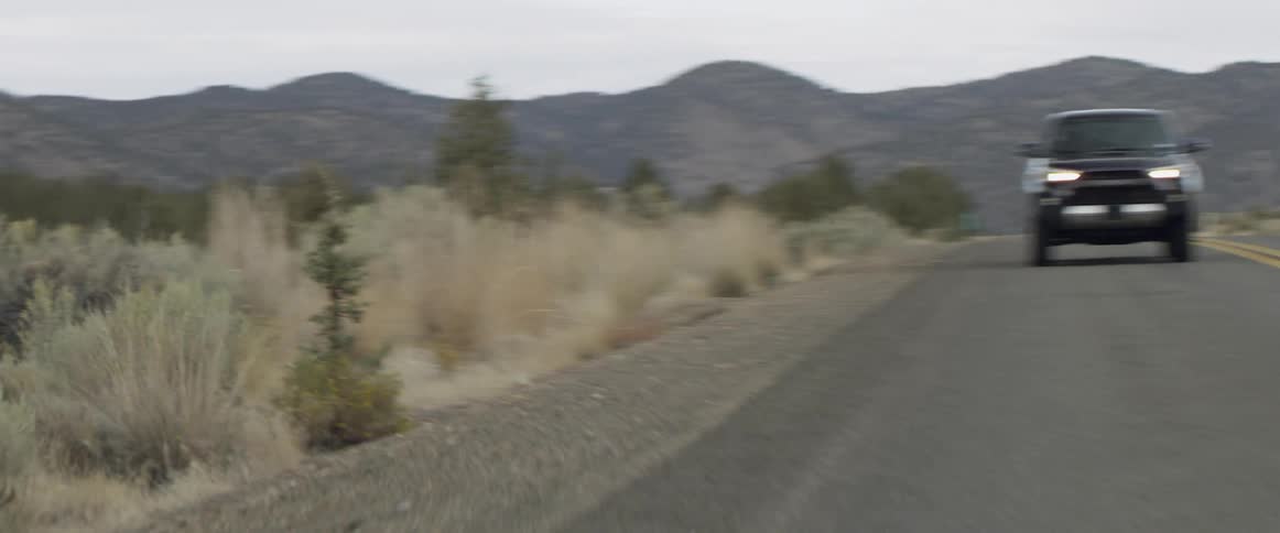 Vehicle drives on a rural road