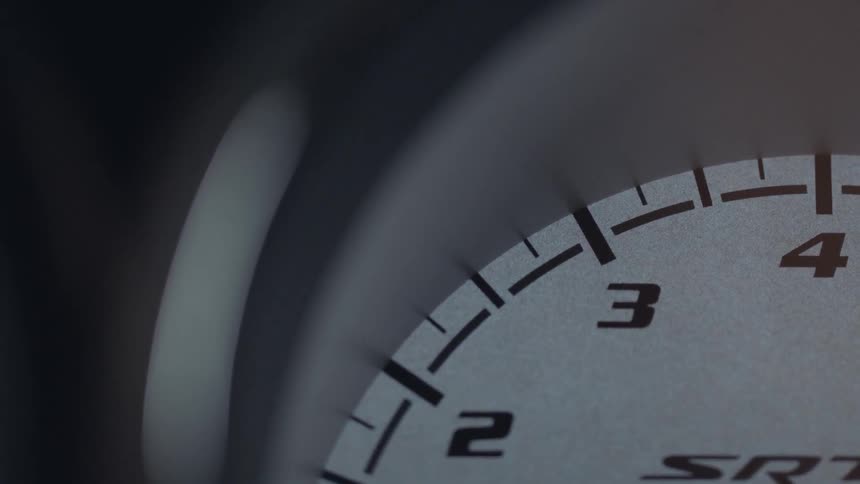 Needle on an odometer rises and falls