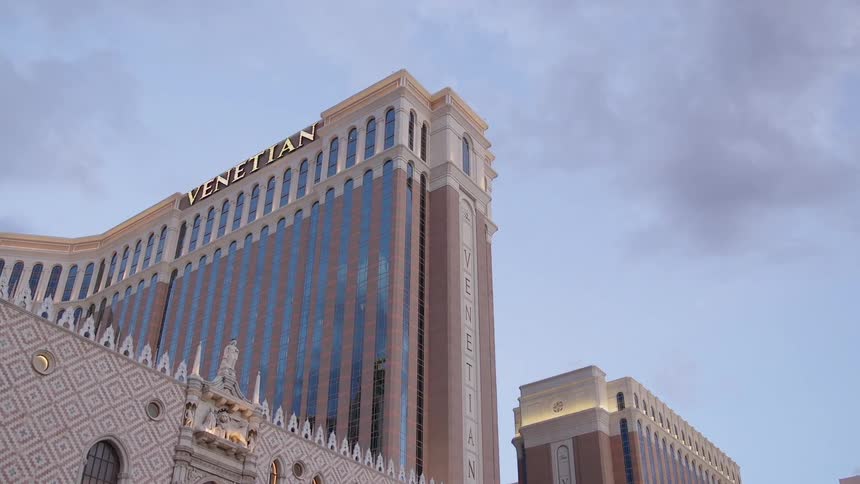 An ornate hotel towers into the sky