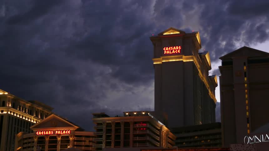 The signs on caesar's palace hotel and casino shine