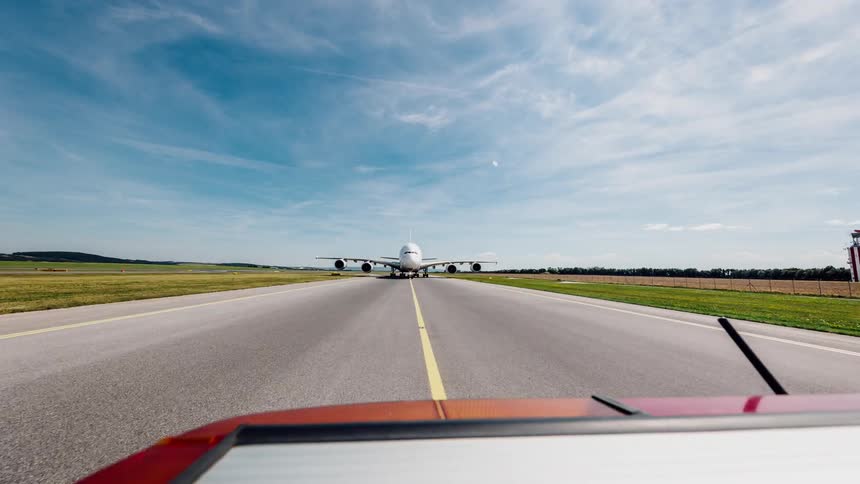 A jet drives on a runway