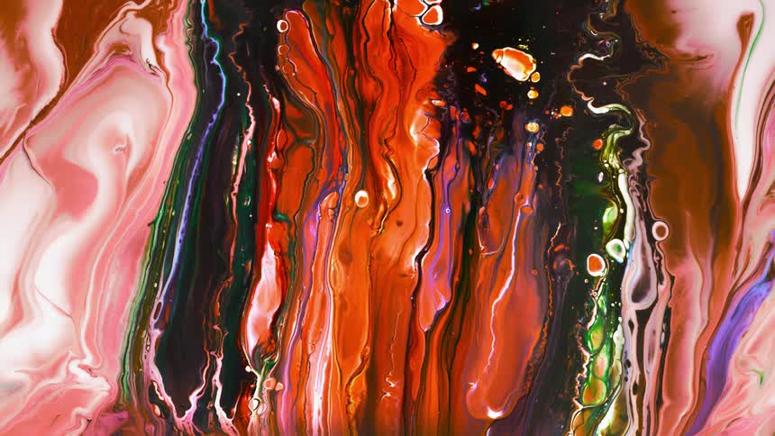 Multi-colored acrylic paint expands slowly