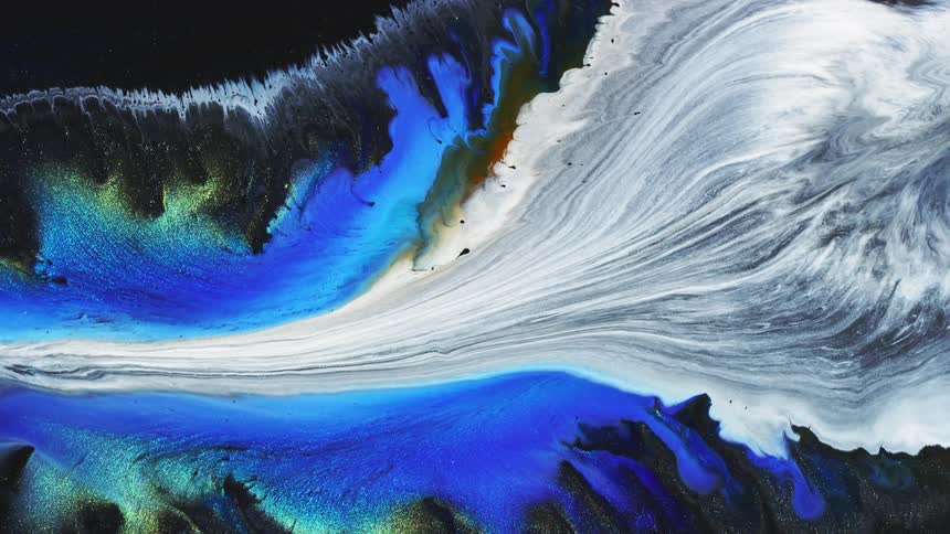 White paint is flowing over a canvas like a river