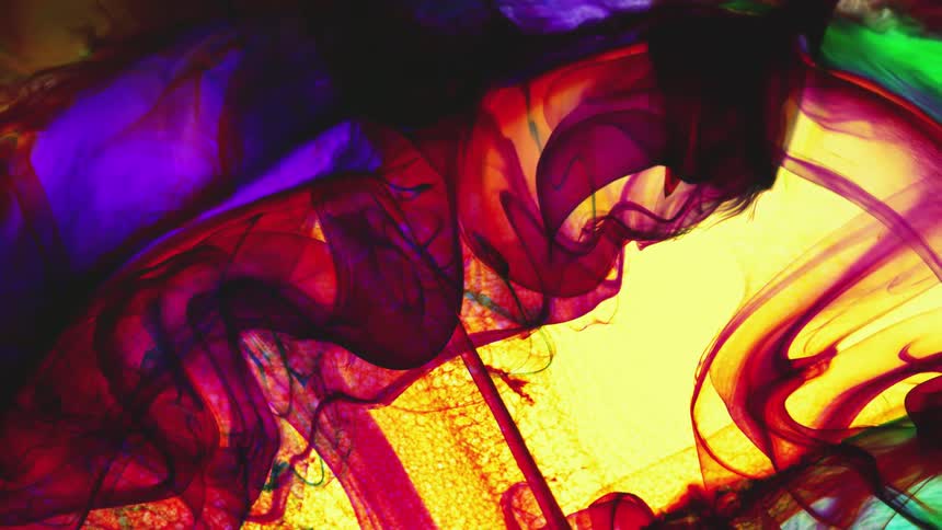 Colors and patterns are swirling in a liquid solution