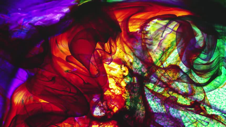 Colors and patterns are swirling in a liquid solution