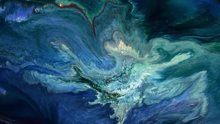 Multi-colored liquid rotates and swirls together
