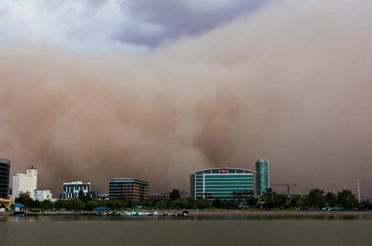 A dust storm engulfs a city