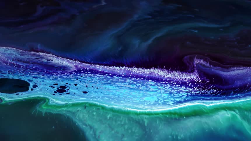 Colorful liquid with bubbles in it oozes