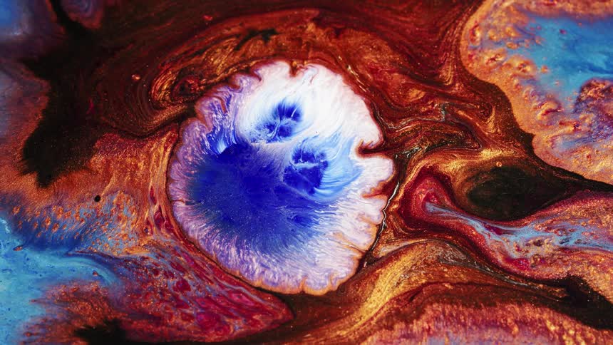 Liquid copper and blue paint create a unique colorful scenery