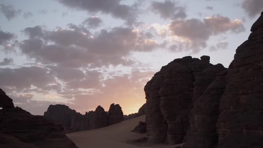 Rock formations cover the ground in the desert
