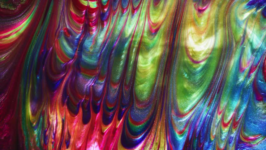 Marbled rainbow colors are shifting in a liquid solution