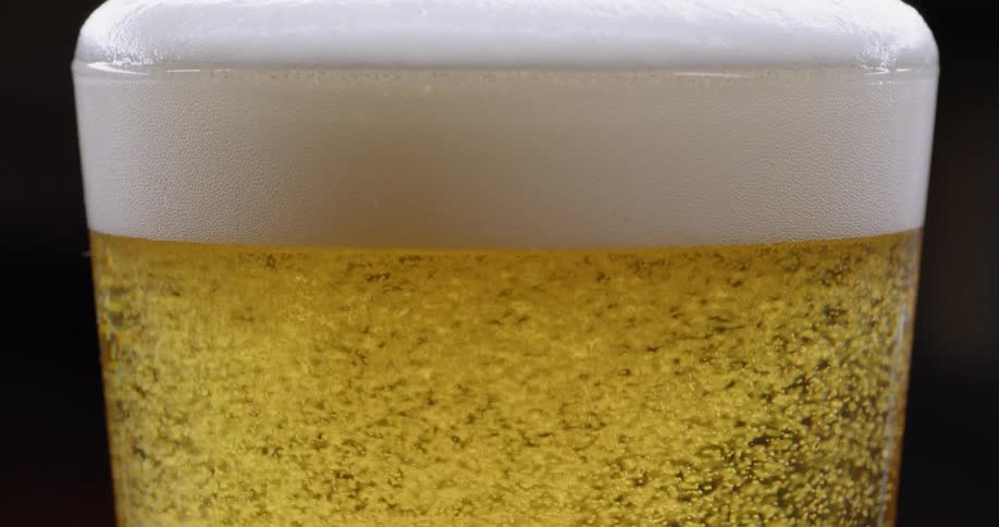 Beer foams in a glass
