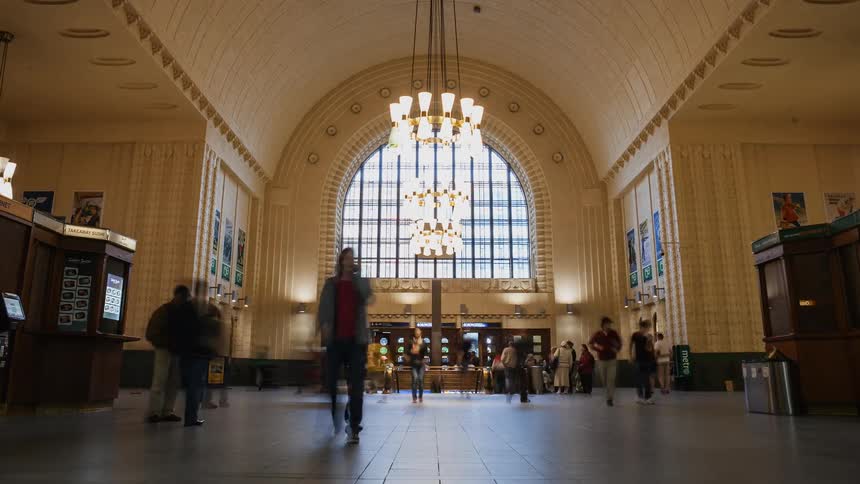 People walk inside a building