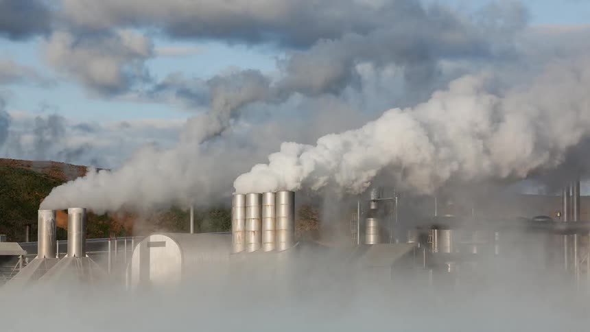 Smoke pours from an industrial site
