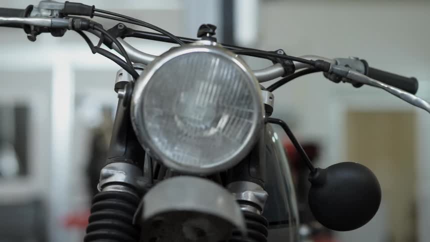 A motorcycle is parked indoors