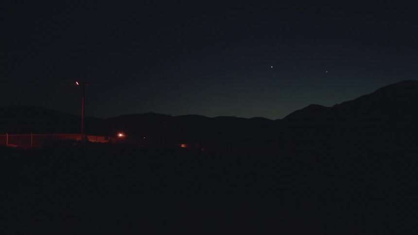 View of a night sky over mountains