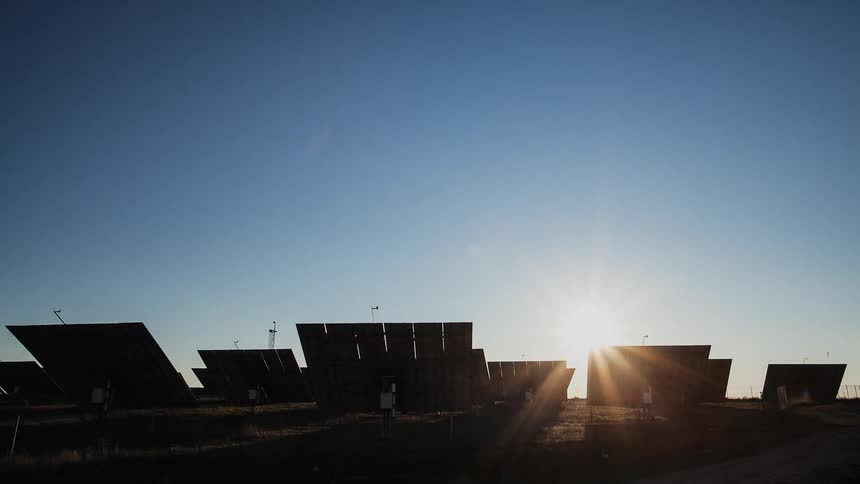 Solar panels pivot through the day