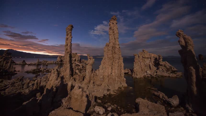 Clouds are drifting over Mono lake at dusk