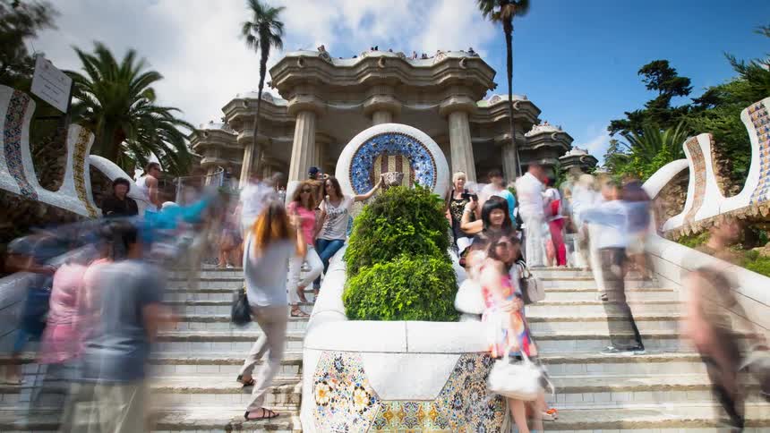 People walk up and down the steps of a tourist attraction