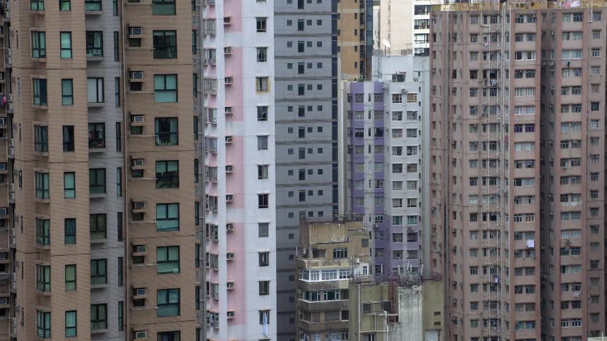 Apartment buildings tower into the sky